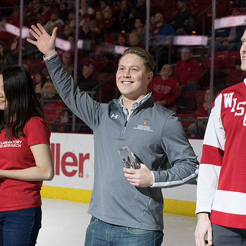 Ian Marsh waves to the audience while receiving his Ride Scholarship